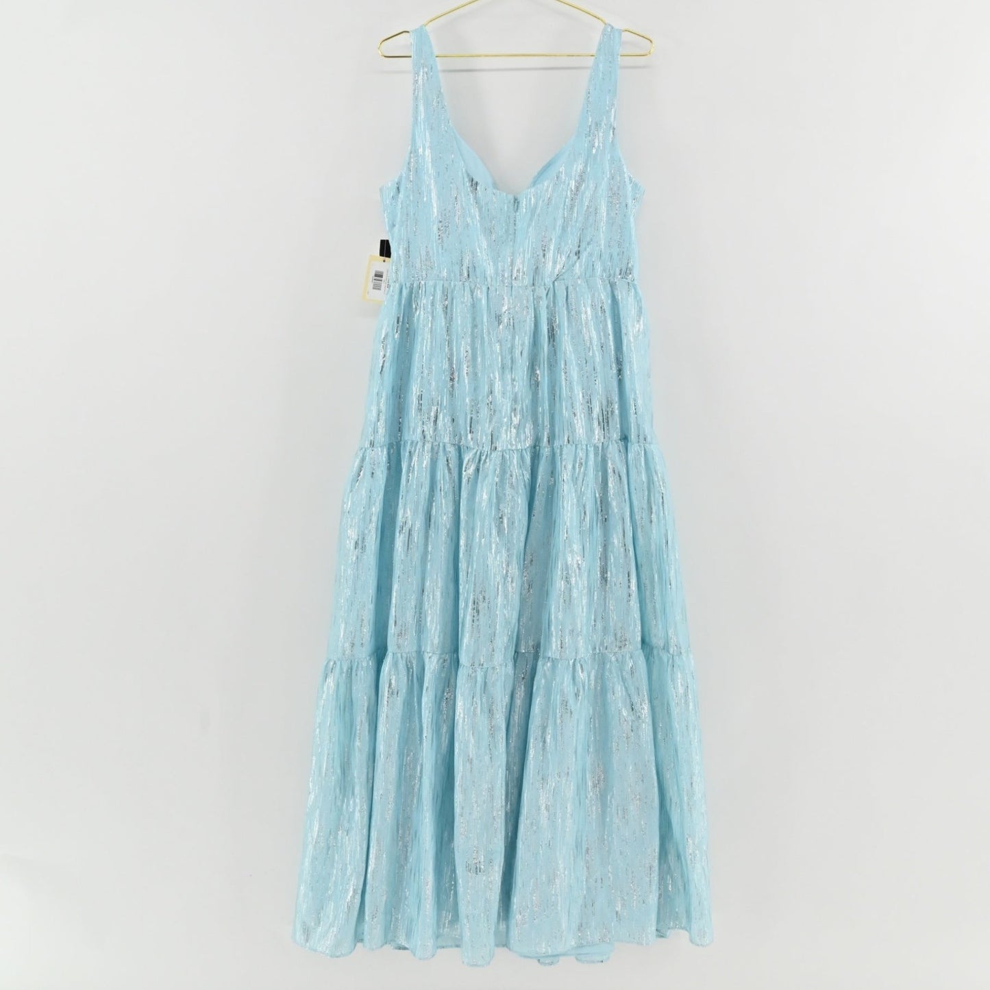 Lynn's Closet Boutique sky blue metallic tiered maxi dress with V-neckline and sleeveless bodice.