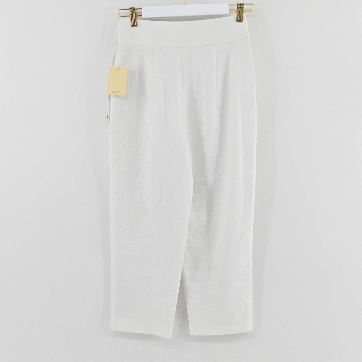 Lynn's Closet Boutique Club Monaco white high-waisted linen-blend cropped trousers with side button detail.