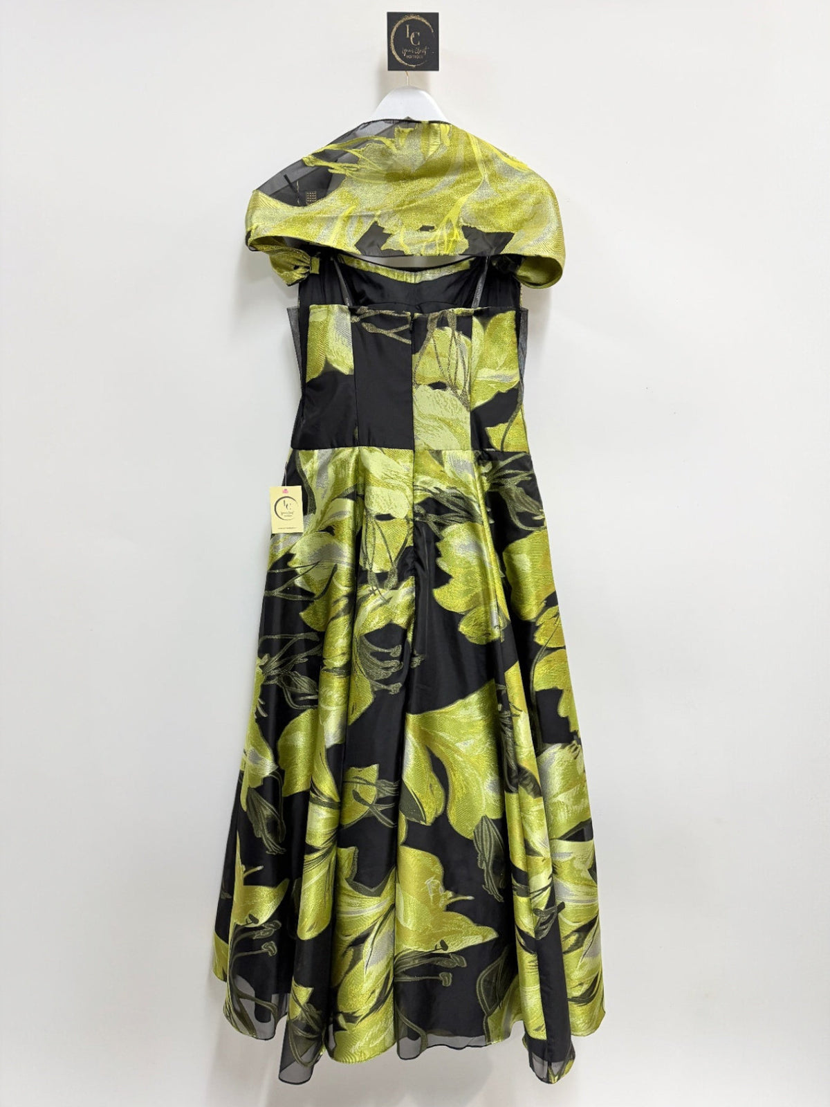 Lynn's Closet Boutique strapless black A-line gown with shimmering lime green floral print and matching bolero wrap.