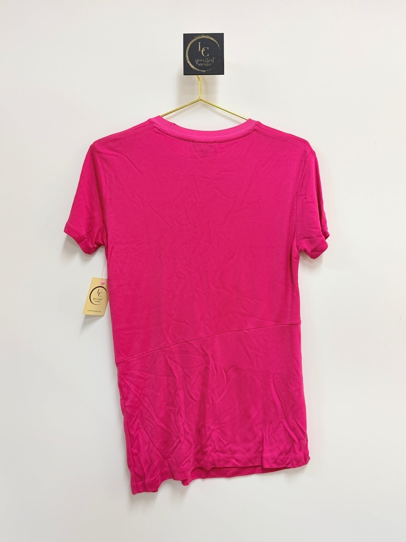 Lynn's Closet Boutique Rag & Bone fuchsia pink short sleeve crew neck top with asymmetrical hem, back view