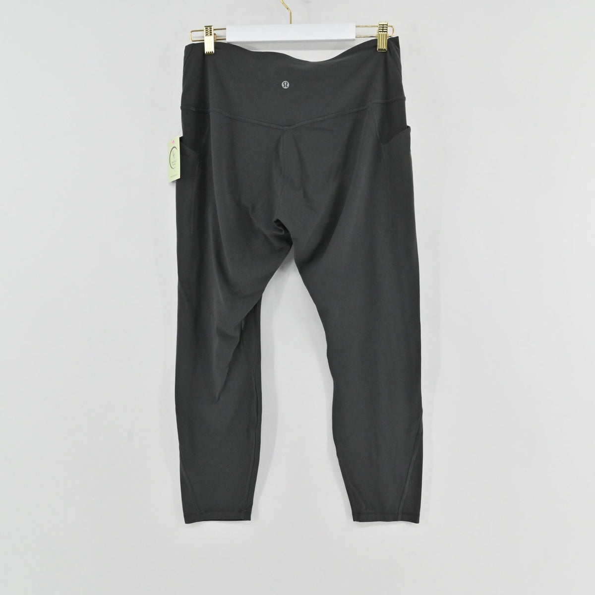 Lynn's Closet Boutique gray Lululemon Align high-rise leggings with side pockets hanging on a white hanger