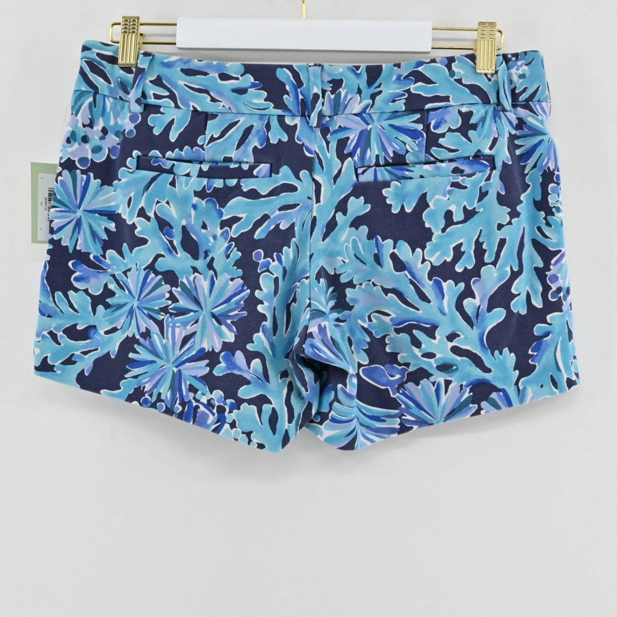 Back view of Lynn's Closet Boutique Lilly Pulitzer Callahan shorts in blue and teal tropical coral print