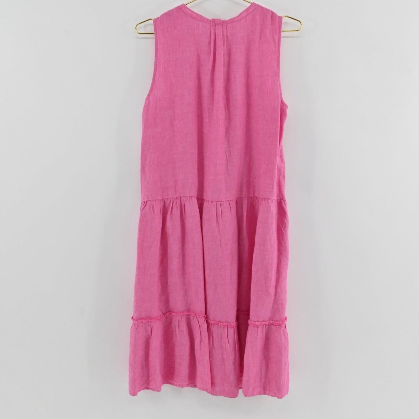 Lynn's Closet Boutique J. McLaughlin pink sleeveless linen midi dress with a tiered skirt and raw-edge detailing.