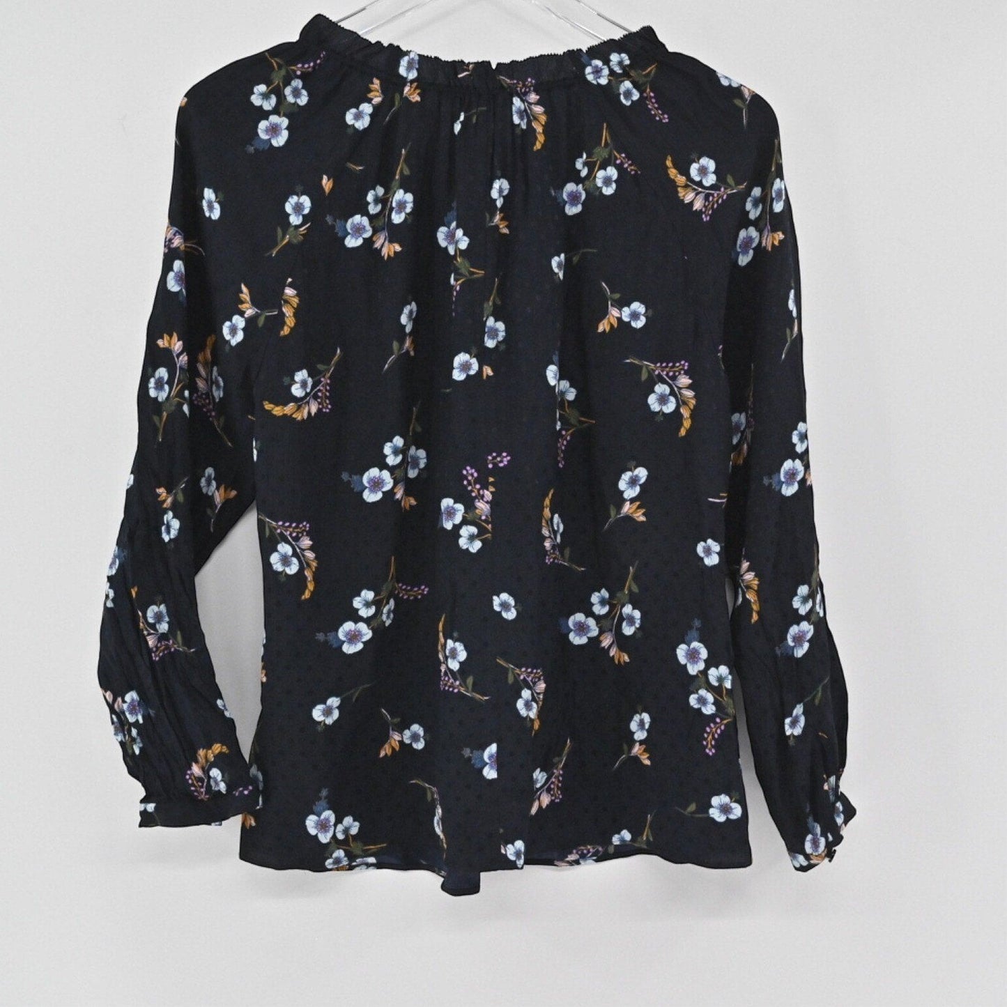 Lynn's Closet Boutique Rebecca Taylor black silk top with multi-colored floral print, gathered neckline, and smocked cuffs