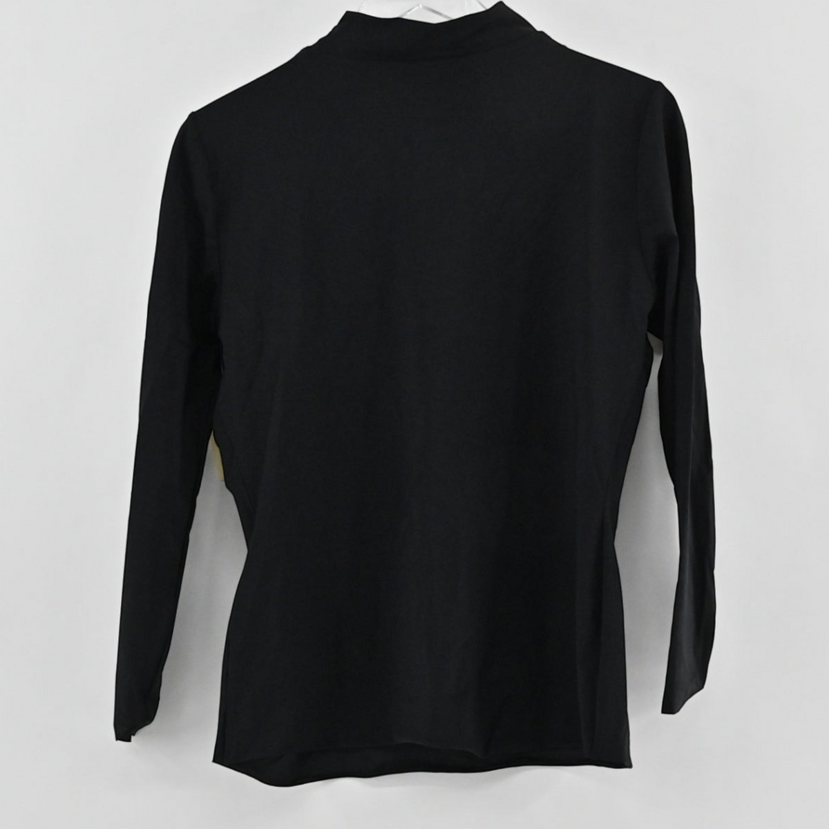 Lynn's Closet Boutique black long-sleeve top with a high neckline, shown hanging against a plain white background.