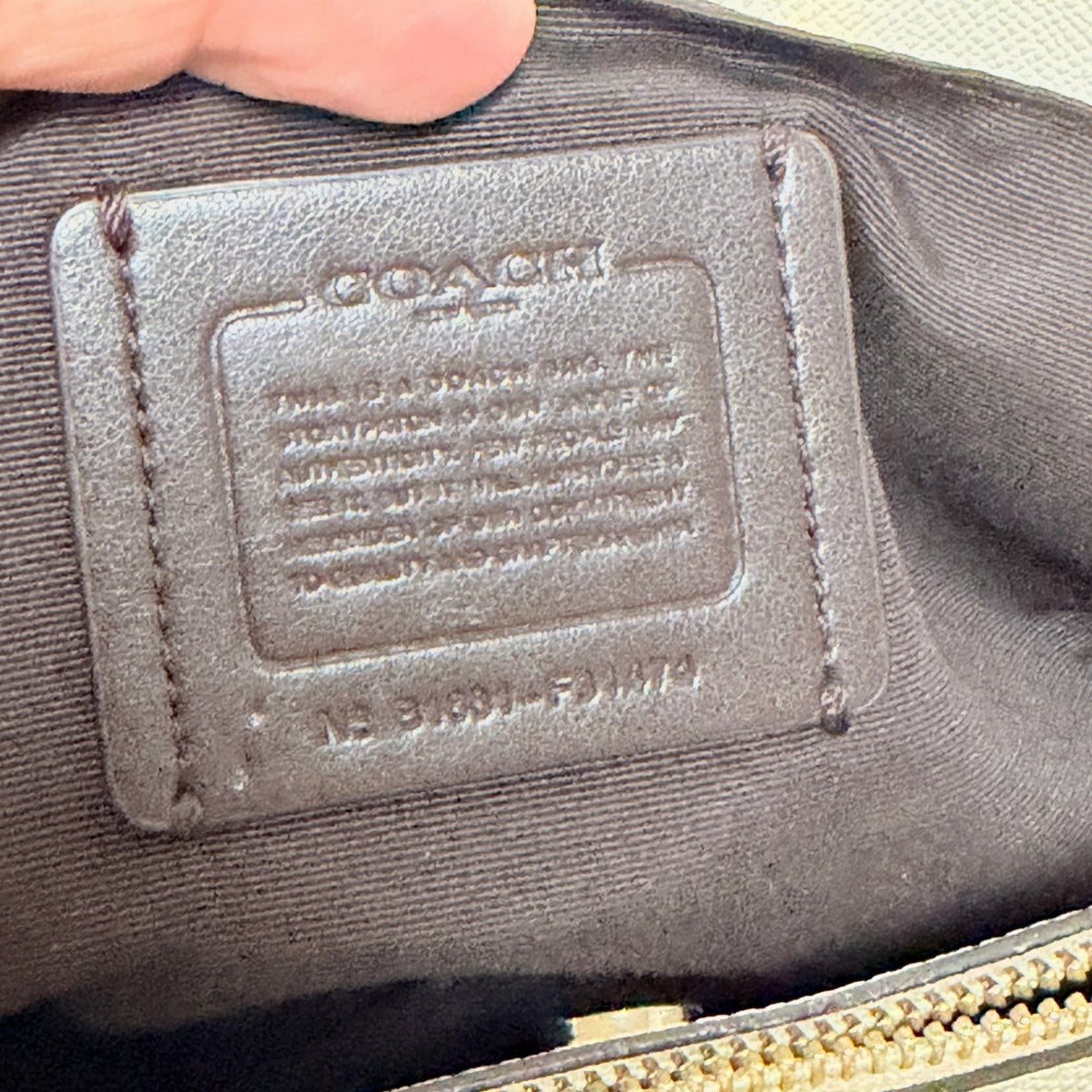 Lynn's Closet Boutique Coach Casey Tote interior leather creed patch with embossed logo and serial number