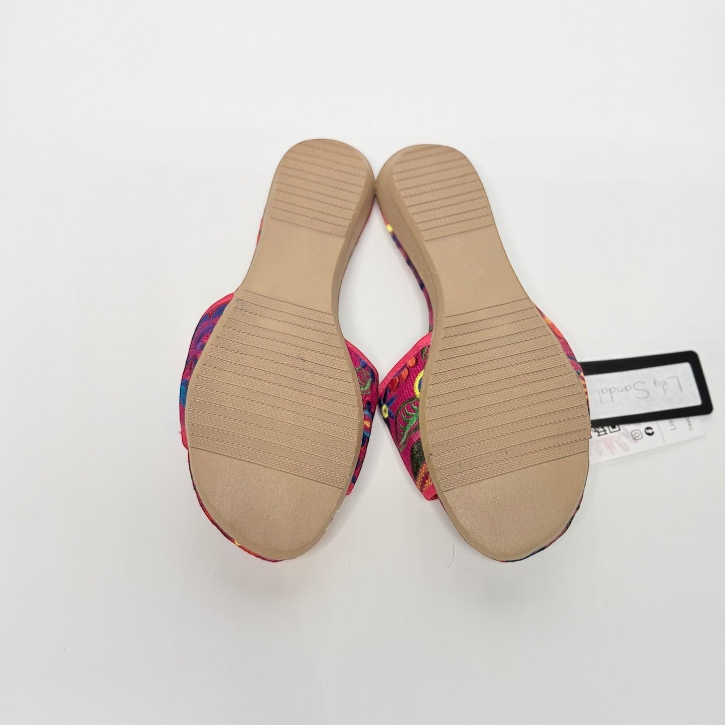 Lynn's Closet Boutique FreeDazz embroidered slides showing the textured tan soles and vibrant floral fabric