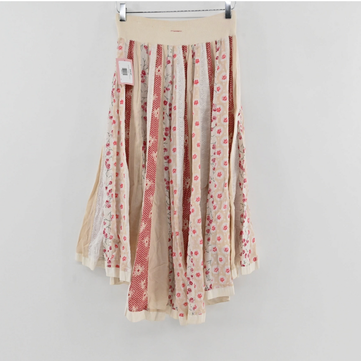 Lynn's Closet Boutique Free People boho high-low skirt in cream and red floral patchwork with elasticized waistband