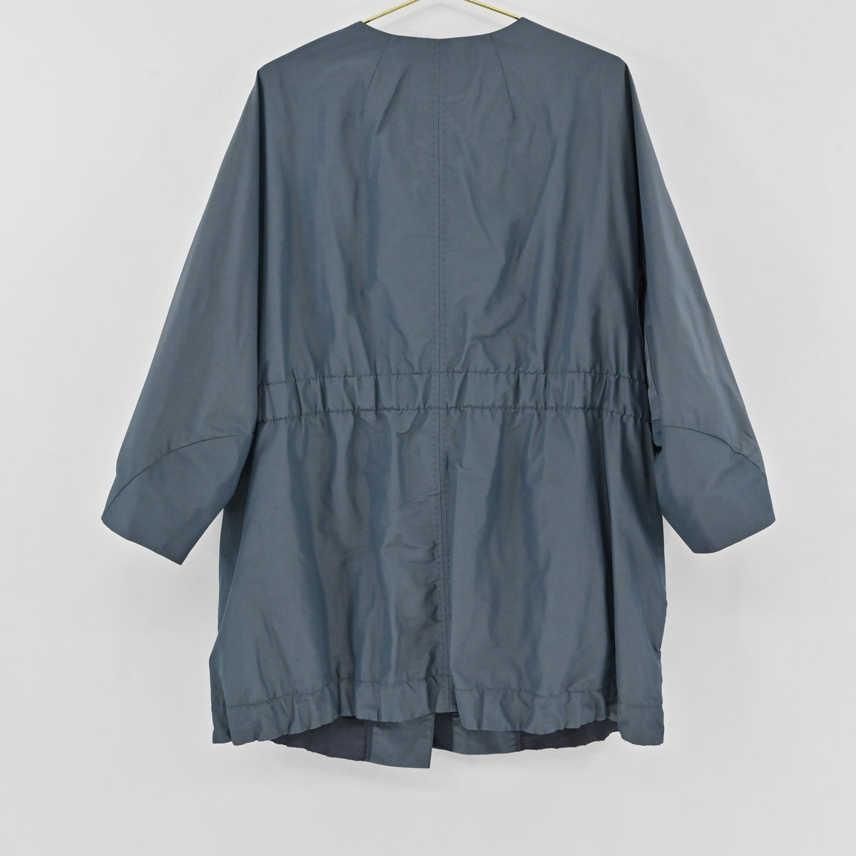 Lynn's Closet Boutique Lafayette 148 NY blue-gray metallic drawstring jacket, back view of collarless utility coat.
