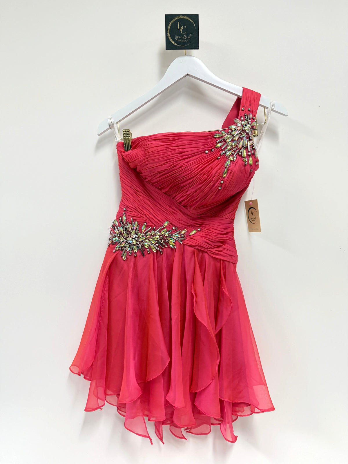 Lynn's Closet Boutique pomegranate one-shoulder chiffon cocktail dress with intricate beaded waist and shoulder detail.