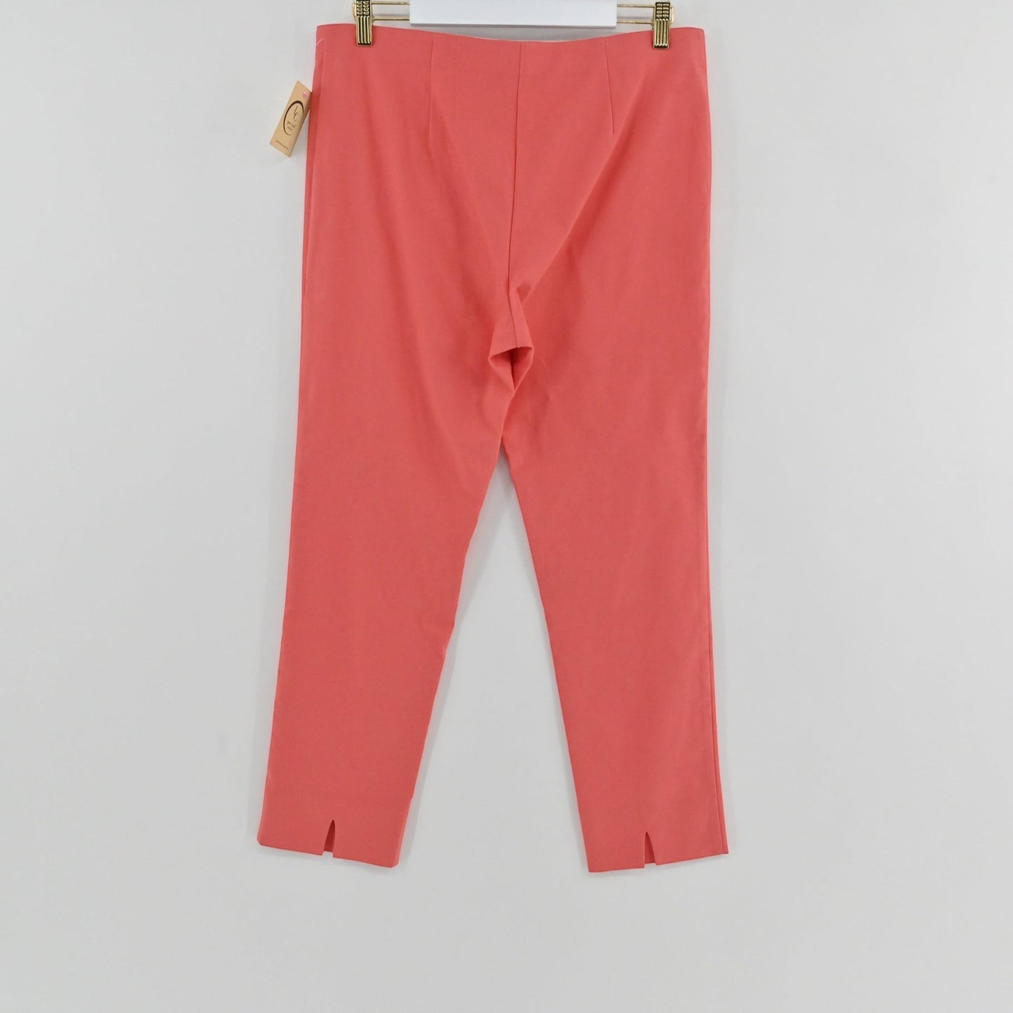Lynn's Closet Boutique Sara Campbell coral tailored pants with a small hem slit, size XL, new with tags.