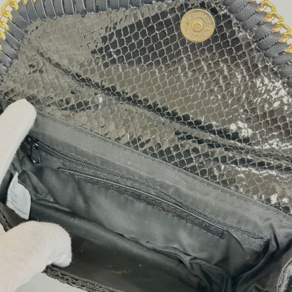 Lynn's Closet Boutique Sondra Roberts black snakeskin-embossed clutch interior with zippered pocket and magnetic snap