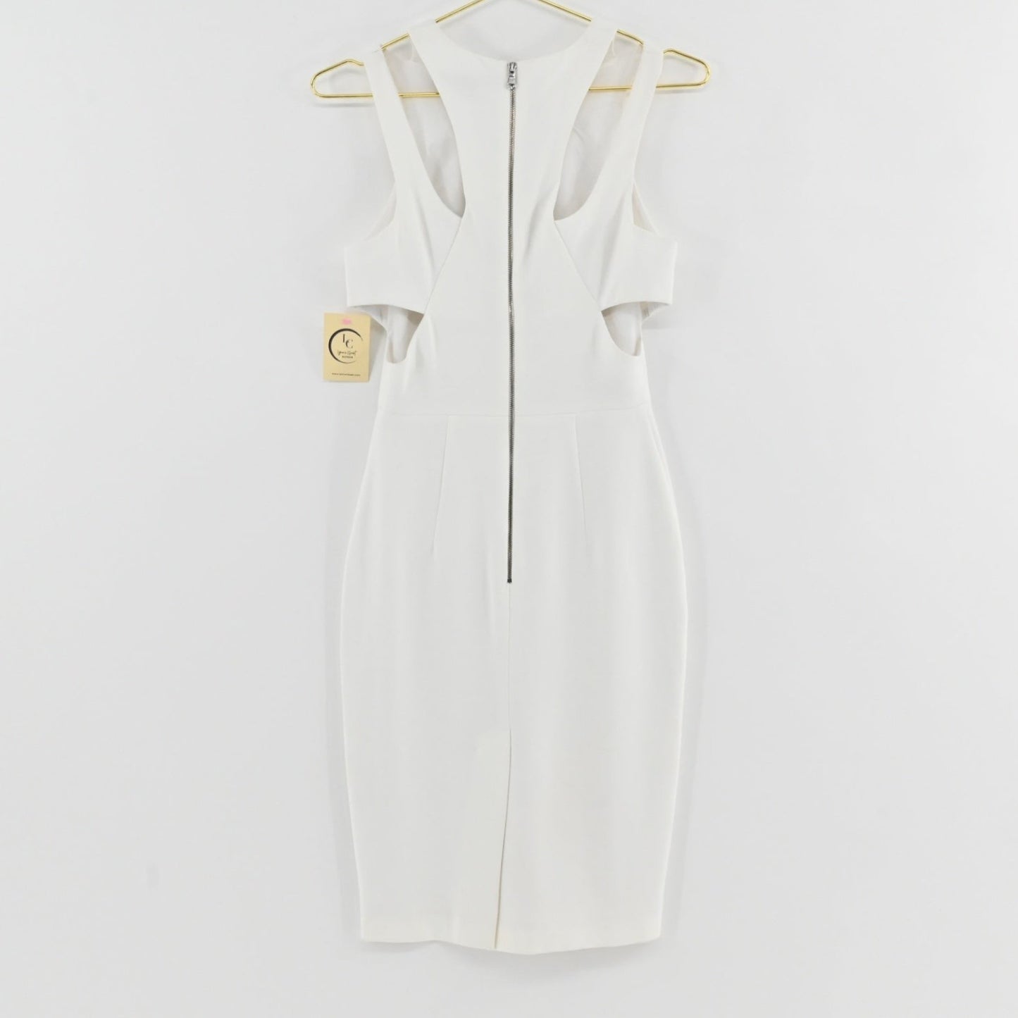 Lynn's Closet Boutique French Connection white midi dress with cold-shoulder cutouts and back zipper closure