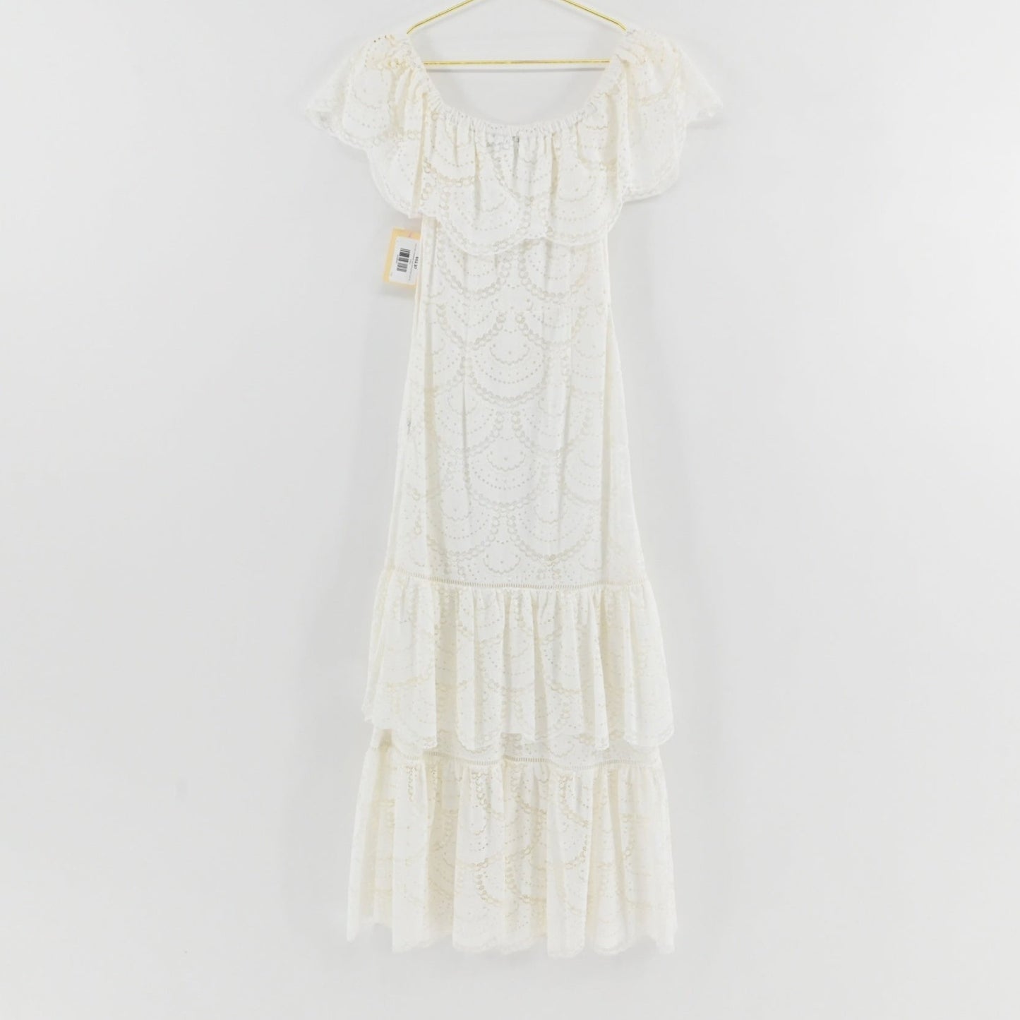 Lynn's Closet Boutique Gianni Bini white midi dress with off-the-shoulder ruffled neckline and tiered scalloped lace