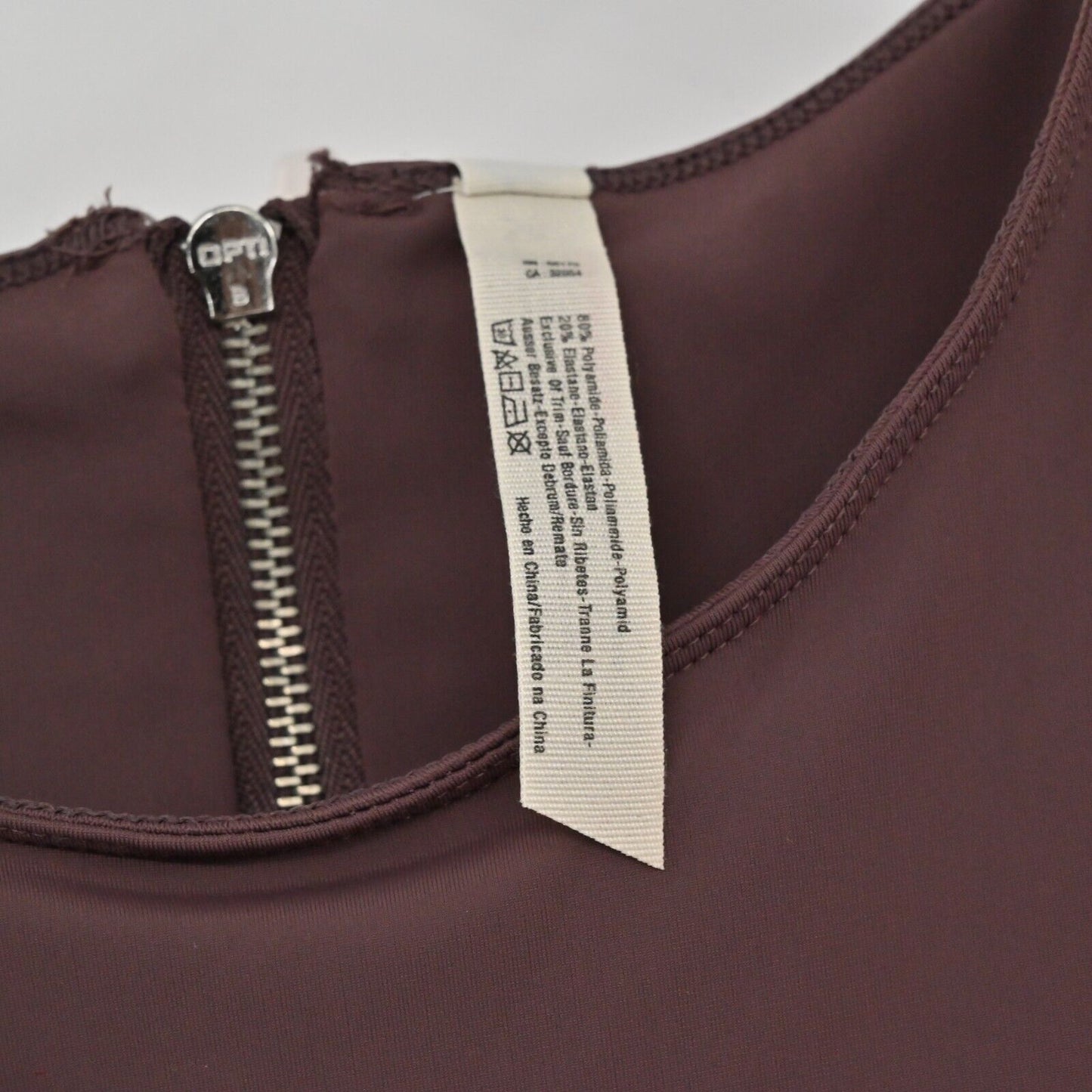 FREE PEOPLE Bodysuit Womens Size M Maroon Cutout Side Round Neck Movement Zip
