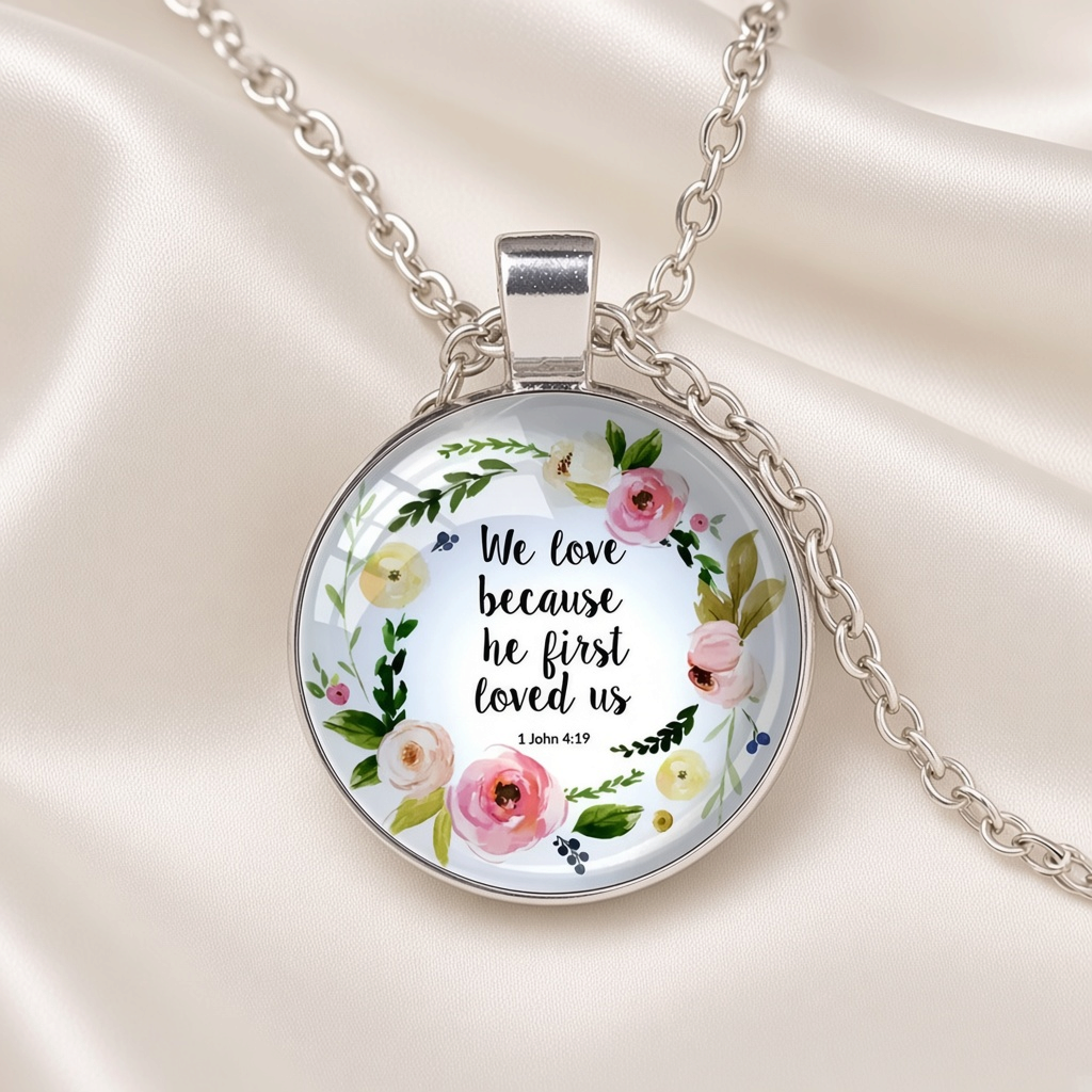 Bible Verse Glass Cabochon Pendant Necklace Floral Wreath Silver Tone - 1 John 4:19 close-up
