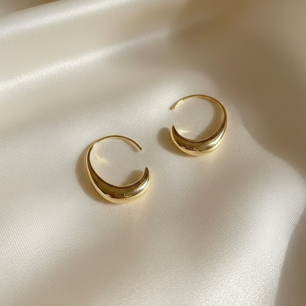Lynn's Closet Boutique gold tone Polished Crescent Hoop Earrings