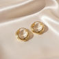 Lynn's Closet Boutique gold tone Twisted Ribbon Hoop Earrings