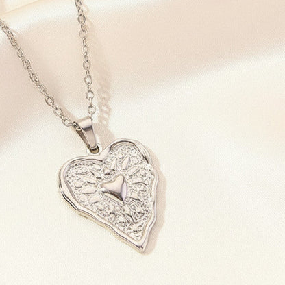 Relief Texture Hollow Heart Pendant Necklace Silver Tone Stainless Steel