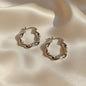Lynn's Closet Boutique Wavy Twisted Hoop Earrings