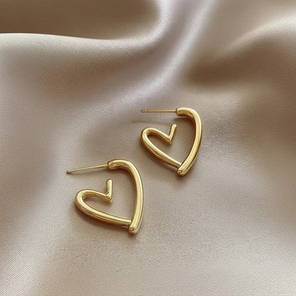 Lynn's Closet Boutique gold tone Hollow Heart Hoop Earrings