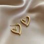 Lynn's Closet Boutique gold tone Hollow Heart Hoop Earrings