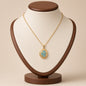 Pressed Flower Locket Pendant Necklace Gold Tone Copper - Oval Gray