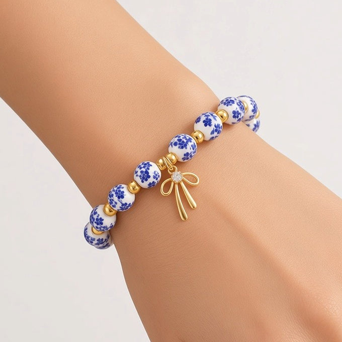 Blue and White Ceramic Bead Bowknot Charm Bracelet - Blue Ceramic