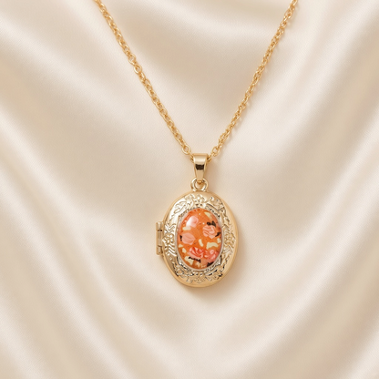Pressed Flower Locket Pendant Necklace Gold Tone Copper - Oval Orange Flower close-up
