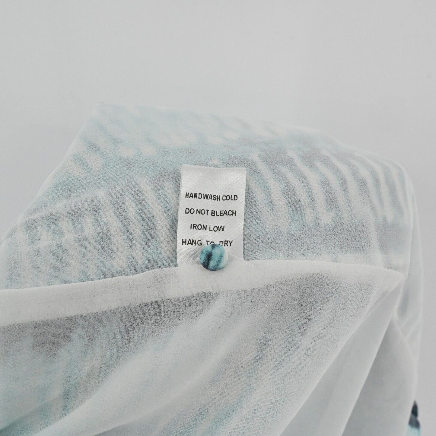 LUXXEL Romper Womens Size L Short Sleeve VNeck Turquoise Printed Tie Waist Frill