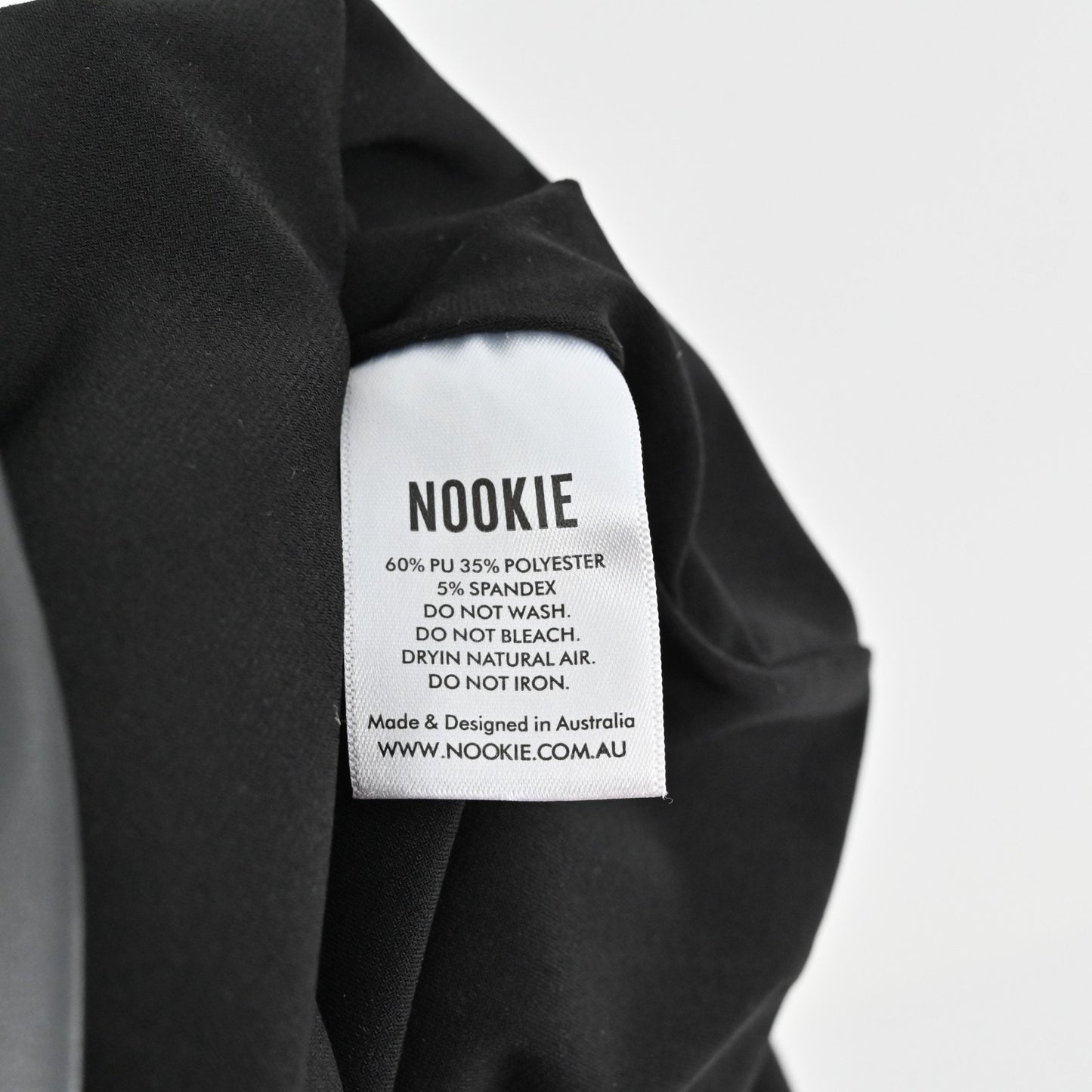 Nookie Rhea Black Faux Leather Mini Dress Size XS Sleeveless Ruched Bodycon