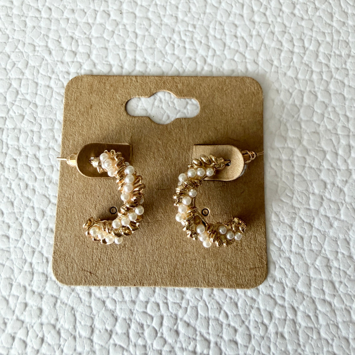 Gold pearl twist hoop earrings
