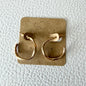 Gold thin wavy hoop earrings
