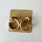Gold wide wavy hoop earrings