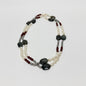 Lynn's Closet Boutique multi-strand necklace with freshwater pearls, red carnelian, and faceted dark agate beads.