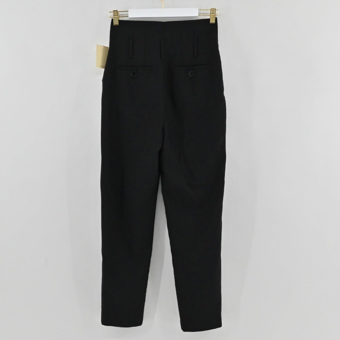 Lynn's Closet Boutique Anine Bing black high-waisted tapered trousers with back button pockets, size XS.