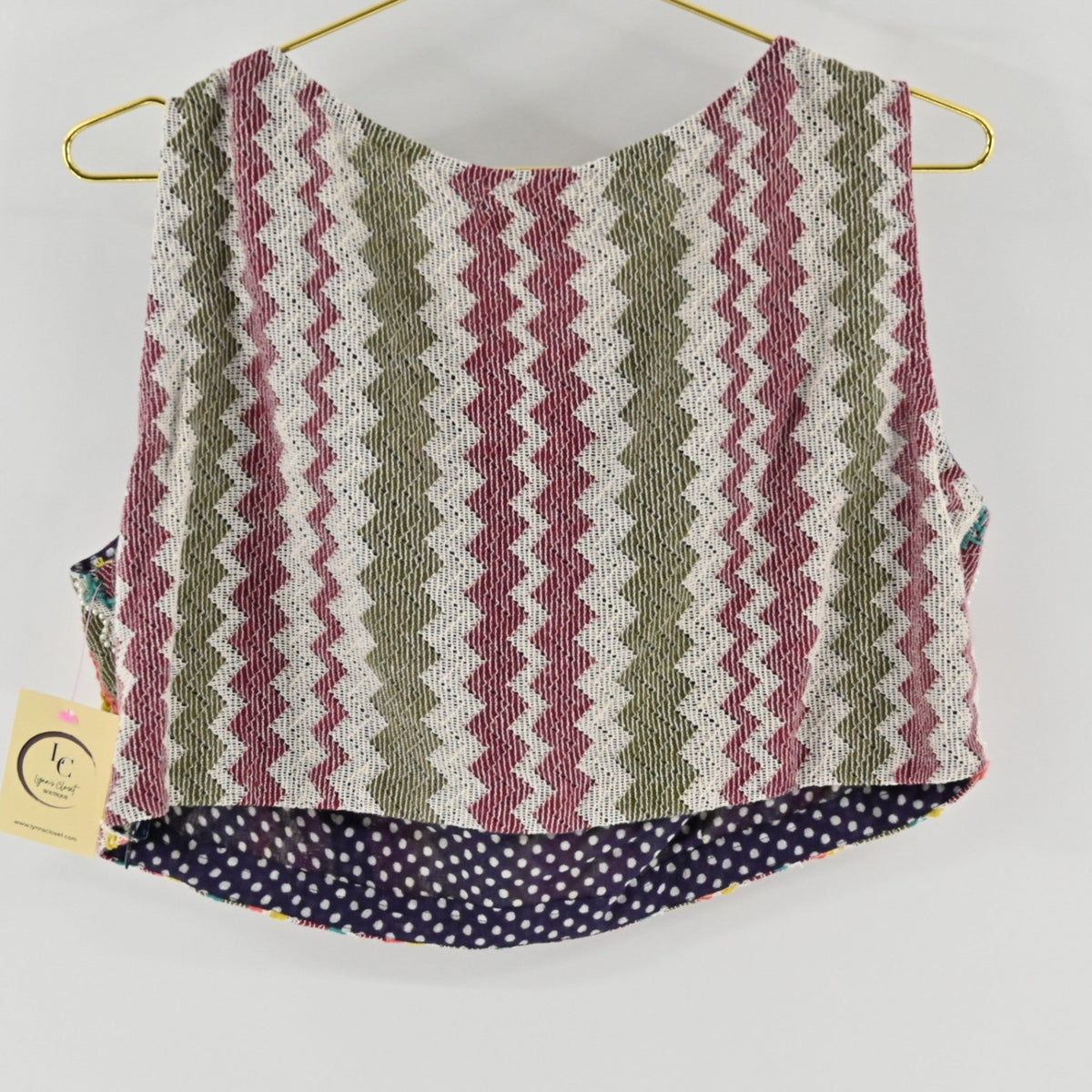 Lynn's Closet Boutique Anthropologie Verb sleeveless cropped top with multi-colored chevron pattern and polka dot lining