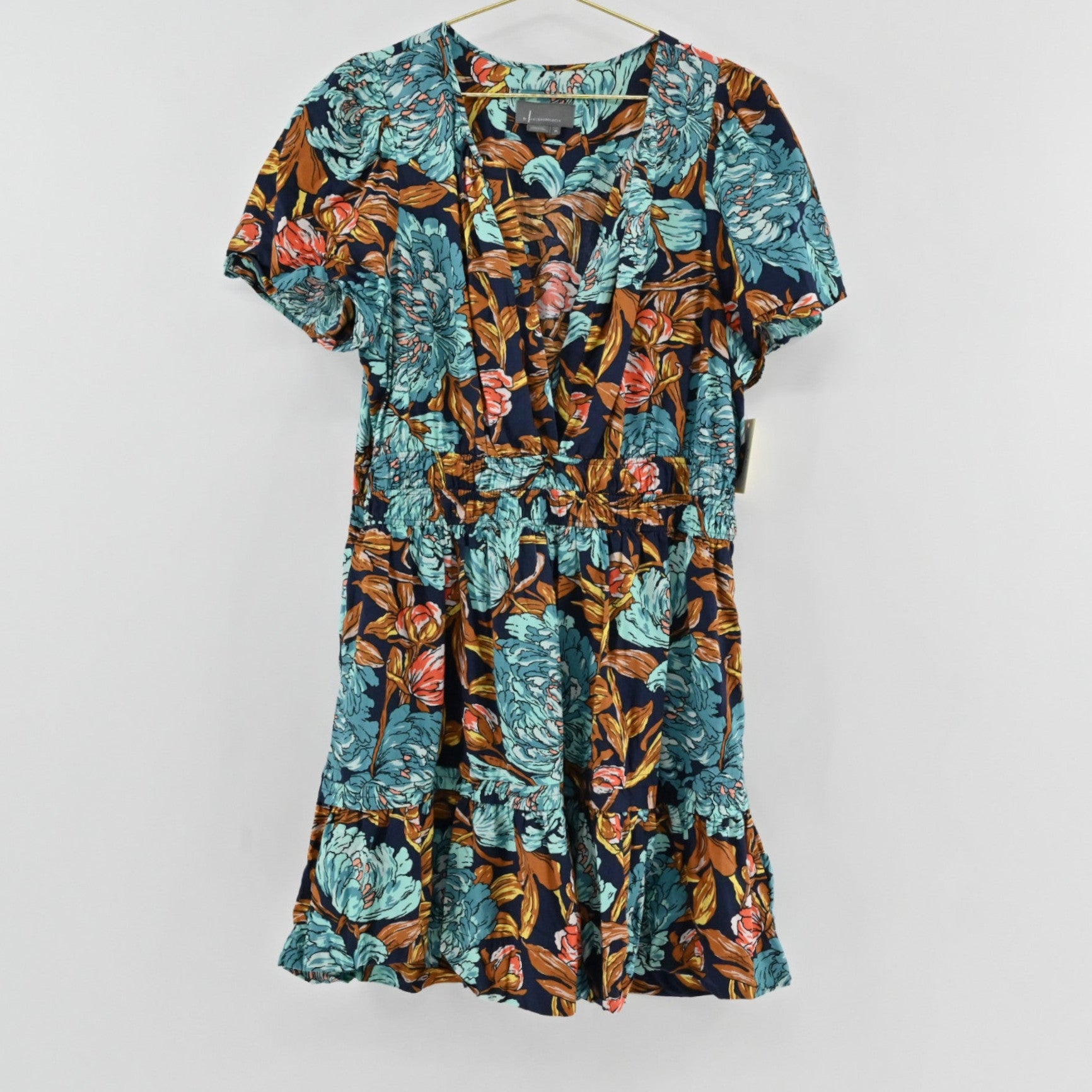 Lynn's Closet Boutique Anthropologie navy floral mini dress with V-neck, flutter sleeves, and tiered skirt.