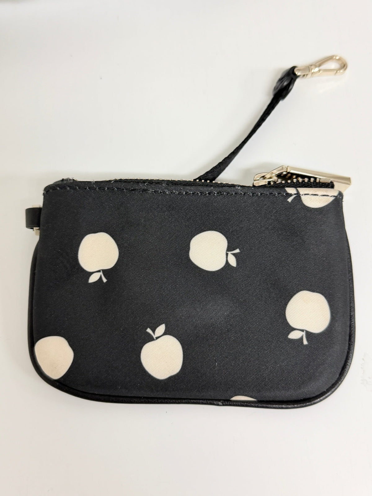 Lynn's Closet Boutique Kate Spade nylon coin purse in black with a white apple print and gold-tone hardware.