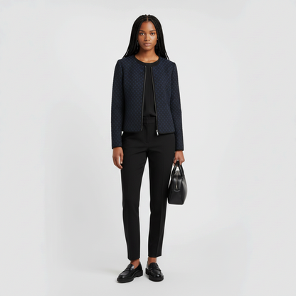 Model wearing a Lynn's Closet Boutique Armani Collezioni navy and black textured collarless zip jacket with trousers