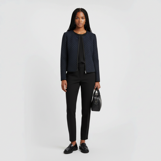 Model wearing a Lynn's Closet Boutique Armani Collezioni navy and black textured collarless zip jacket with trousers