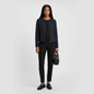 Model wearing a Lynn's Closet Boutique Armani Collezioni navy and black textured collarless zip jacket with trousers