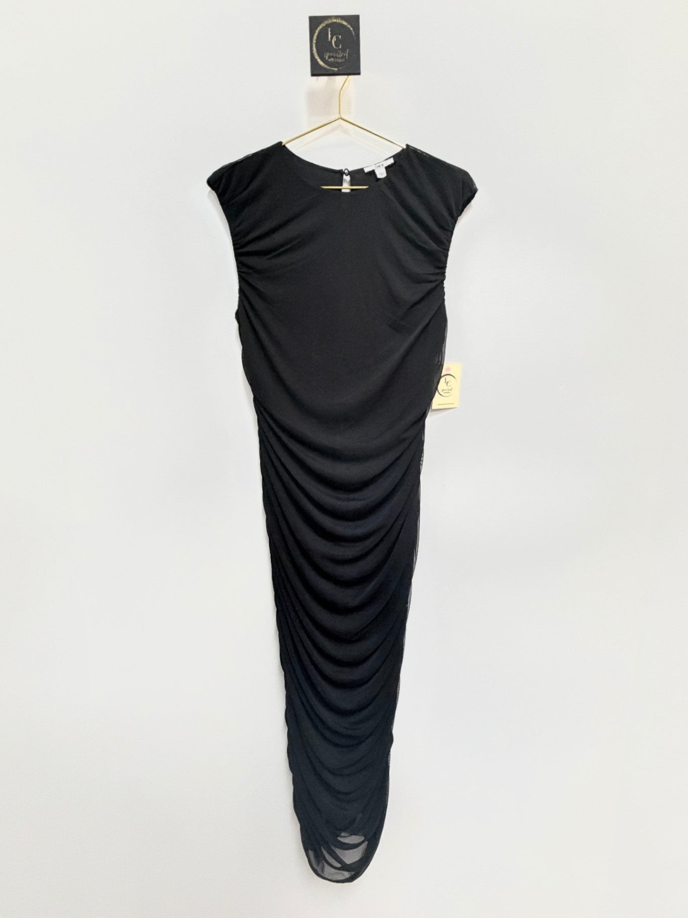 Lynn's Closet Boutique Bar III black sleeveless maxi dress with all-over ruched detailing and a form-fitting design.