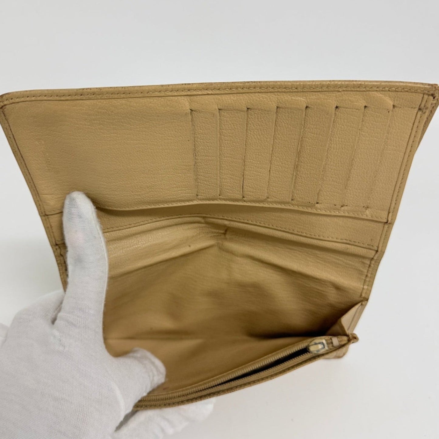 Lynn's Closet Boutique pre-owned beige leather Chanel bi-fold wallet interior with card slots and zipper pocket