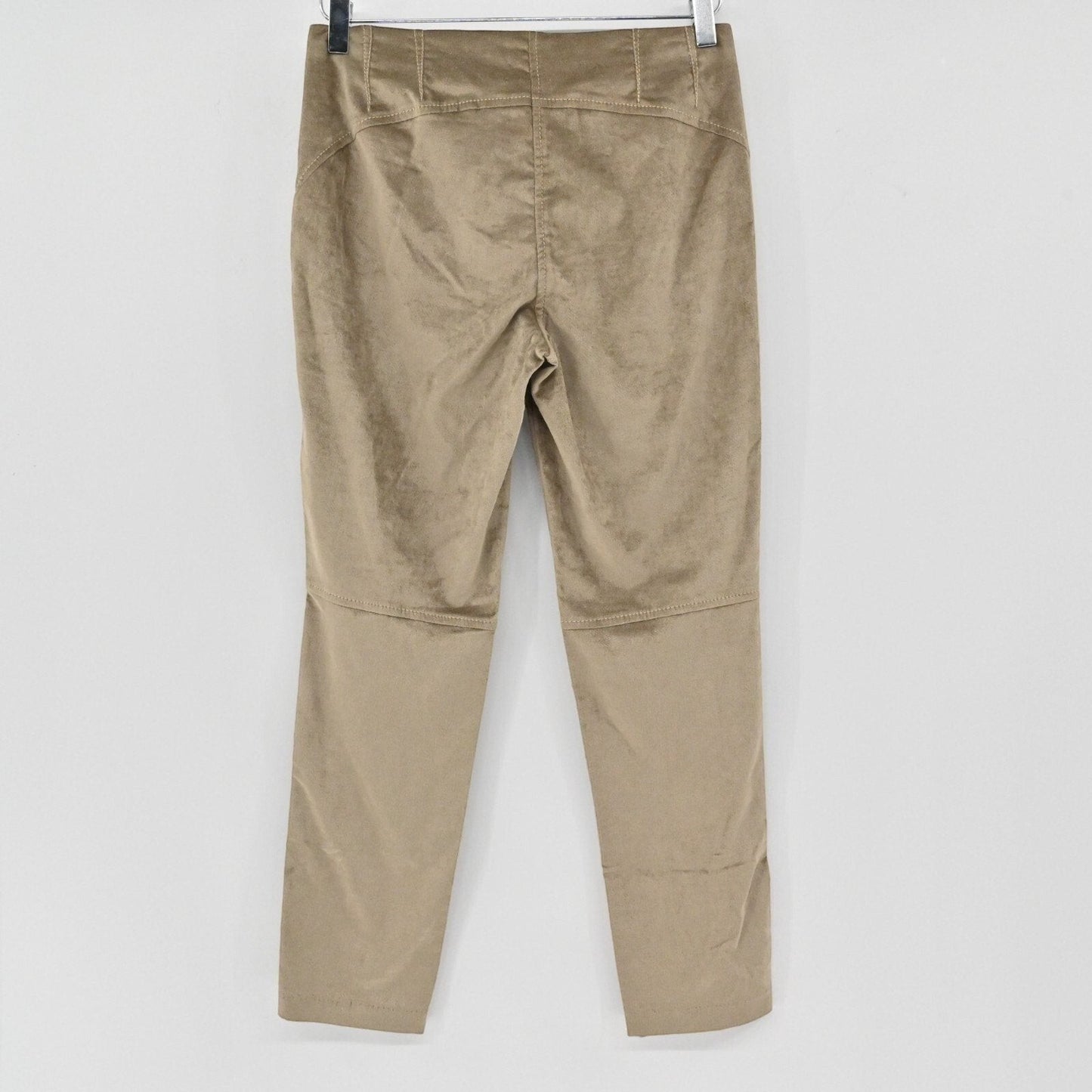 Lynn's Closet Boutique beige velvet slim-fit trousers with paneling and stitching details, back view.