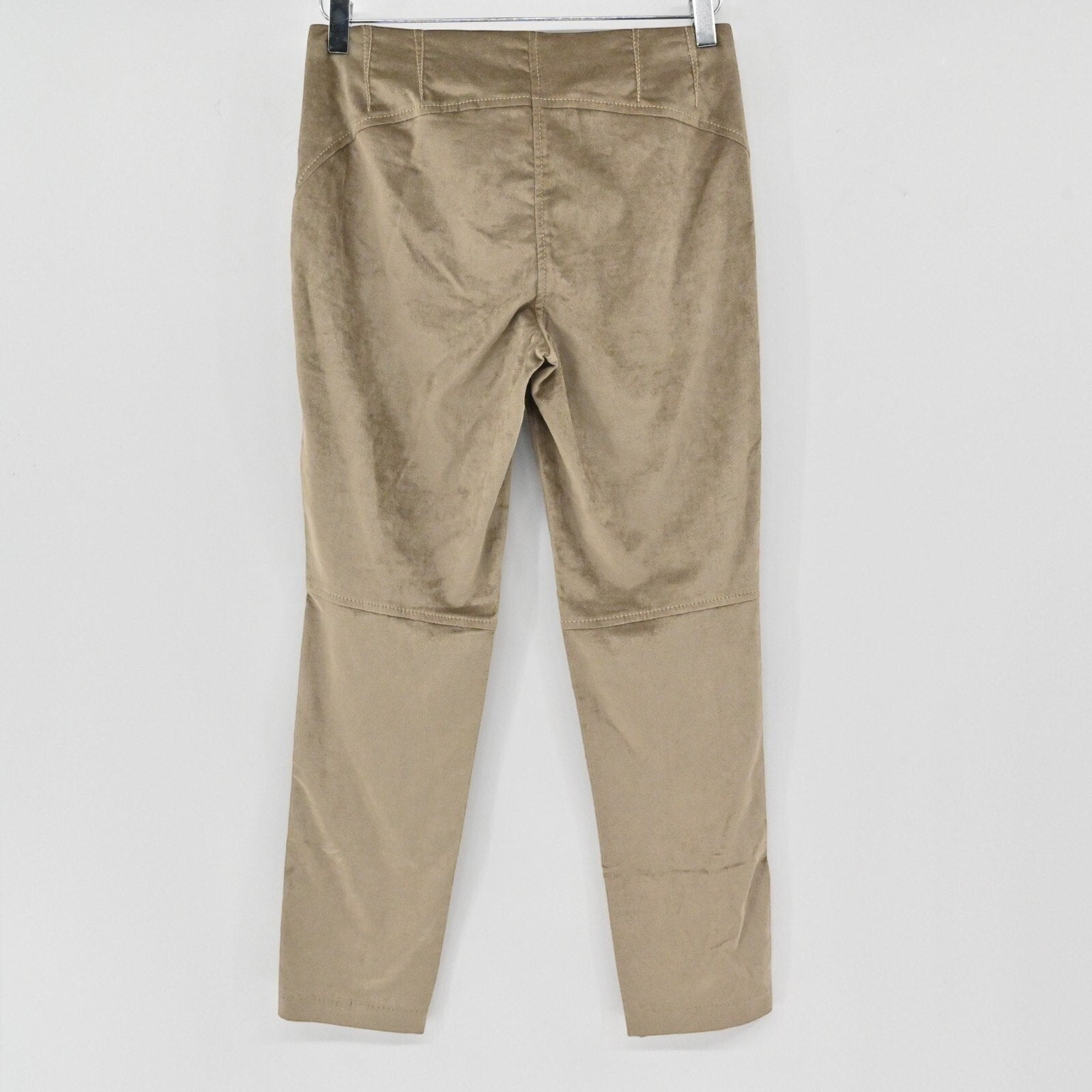 Lynn's Closet Boutique beige velvet slim-fit trousers with paneling and stitching details, back view.