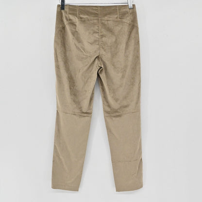 Lynn's Closet Boutique beige velvet slim-fit trousers with paneling and stitching details, back view.