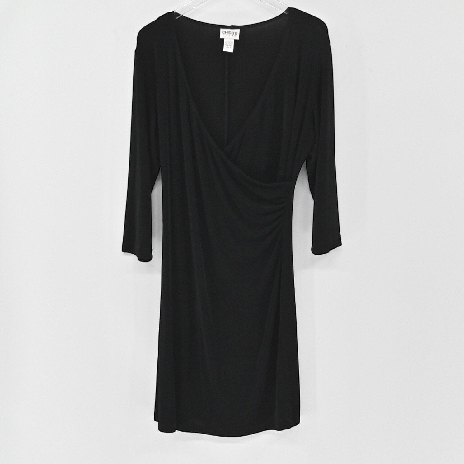 Lynn's Closet Boutique black Chicos Travelers faux wrap dress with three-quarter sleeves and side ruching