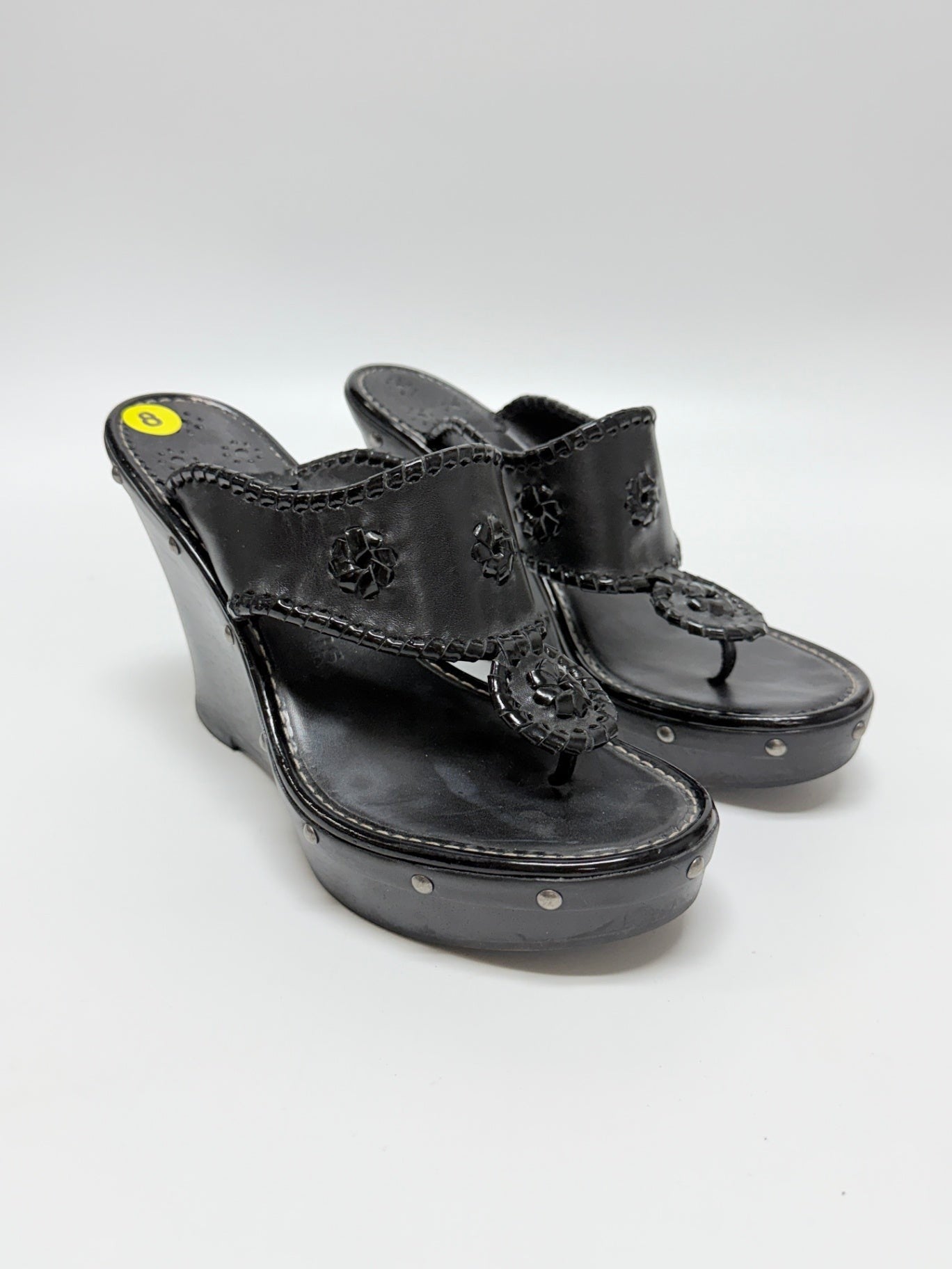 Lynn's Closet Boutique black leather Jack Rogers wedge sandals with signature whipstitch and floral accents, size 8.