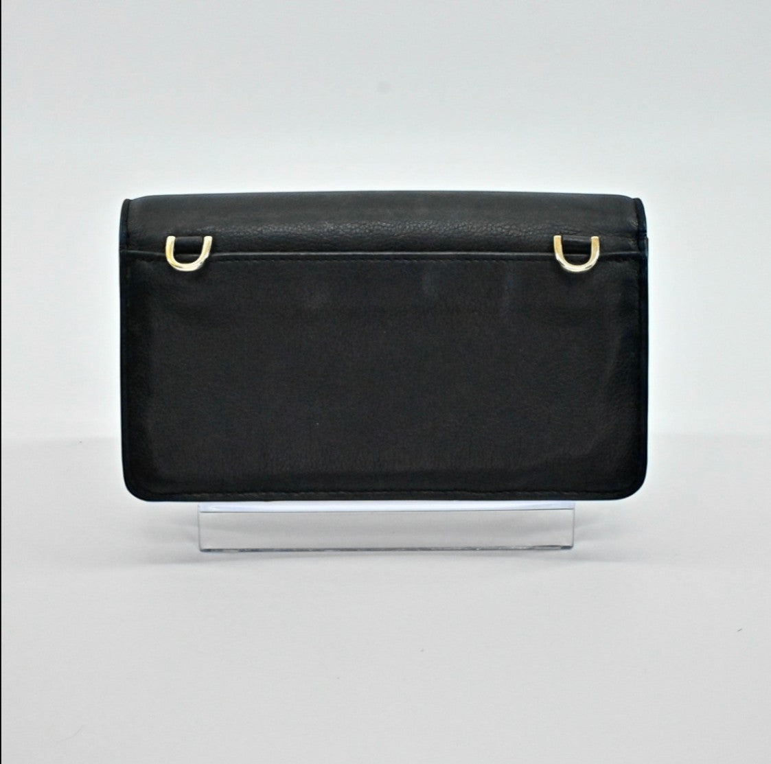Lynn's Closet Boutique Kate Spade black pebbled leather crossbody bag back view with gold hardware attachments